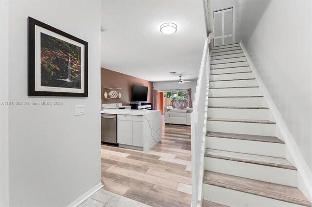 1114 NW 100th Ave, Pembroke Pines, FL 33024 - staircase with ceiling fan and wood finished floors