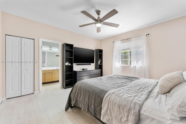 1114 NW 100th Ave, Pembroke Pines, FL 33024 - bedroom with light wood-style flooring, ceiling fan, and ensuite bath