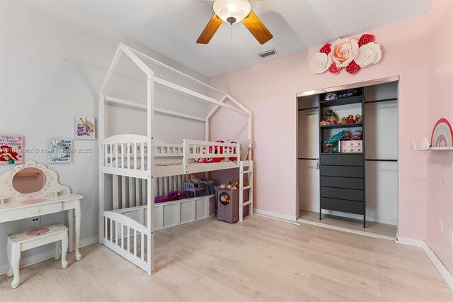 1114 NW 100th Ave, Pembroke Pines, FL 33024 - bedroom with ceiling fan, wood finished floors, and a crib
