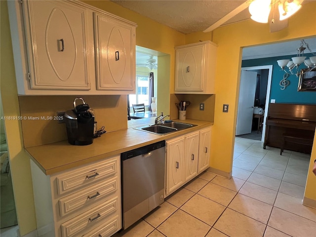 1500 NW 90th Way, Plantation, FL 33322 - kitchen featuring dishwasher, ceiling fan, light countertops, white cabinetry, and a textured ceiling