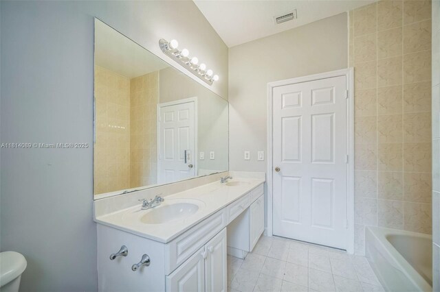 3223 SE 2nd Dr, Homestead, FL 33033 - bathroom featuring double vanity and a bath