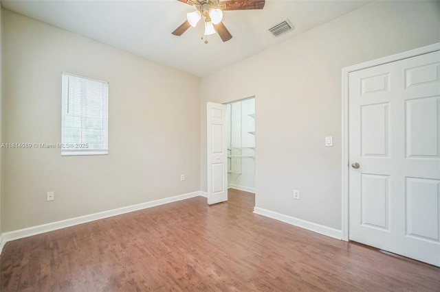 3223 SE 2nd Dr, Homestead, FL 33033 - unfurnished bedroom with wood finished floors and a ceiling fan