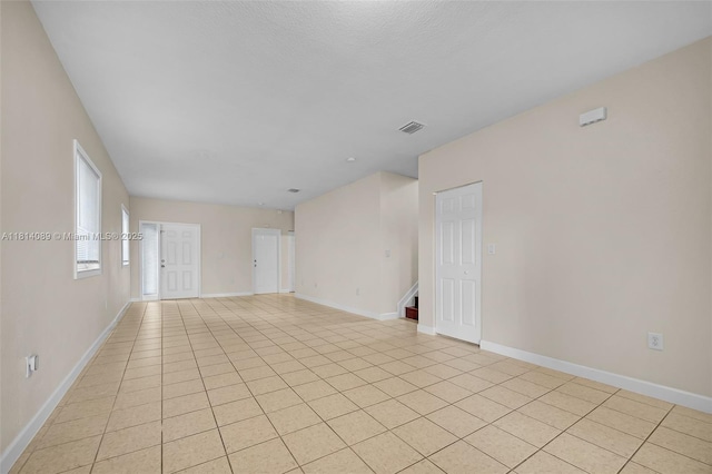 3223 SE 2nd Dr, Homestead, FL 33033 - unfurnished room featuring baseboards and light tile patterned floors