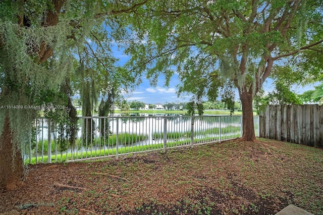 3223 SE 2nd Dr, Homestead, FL 33033 - fenced backyard featuring a water view
