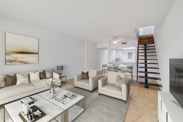 1121 SW 105th Ave Unit 302, Miami, FL 33174 - living room with a ceiling fan, stairway, and light tile patterned flooring