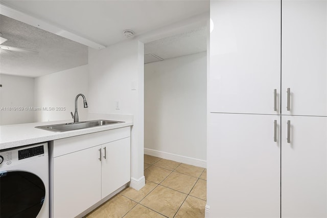 1121 SW 105th Ave Unit 302, Miami, FL 33174 - laundry room with washer / dryer, light tile patterned flooring, a textured ceiling, baseboards, and ceiling fan