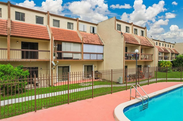 1121 SW 105th Ave Unit 302, Miami, FL 33174 - community pool with a patio