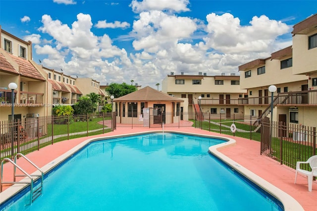 1121 SW 105th Ave Unit 302, Miami, FL 33174 - community pool with a gazebo, a residential view, and a patio