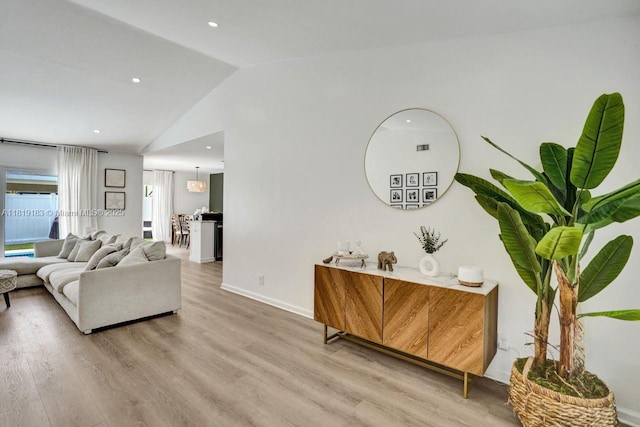 18998 Cloud Lake Cir, Boca Raton, FL 33496 - living area with lofted ceiling, light wood-style flooring, and recessed lighting