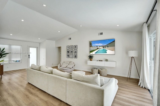 18998 Cloud Lake Cir, Boca Raton, FL 33496 - living area featuring lofted ceiling, light wood finished floors, and recessed lighting