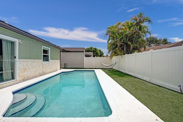 18998 Cloud Lake Cir, Boca Raton, FL 33496 - view of swimming pool featuring a fenced backyard