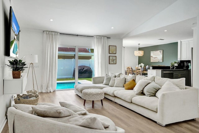18998 Cloud Lake Cir, Boca Raton, FL 33496 - living area featuring light wood-type flooring, lofted ceiling, and recessed lighting