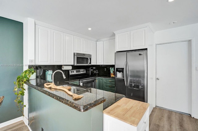 18998 Cloud Lake Cir, Boca Raton, FL 33496 - kitchen featuring stainless steel appliances, light wood-type flooring, white cabinetry, and recessed lighting