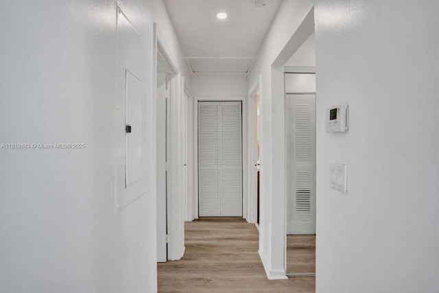 18998 Cloud Lake Cir, Boca Raton, FL 33496 - corridor with light wood-style flooring and baseboards