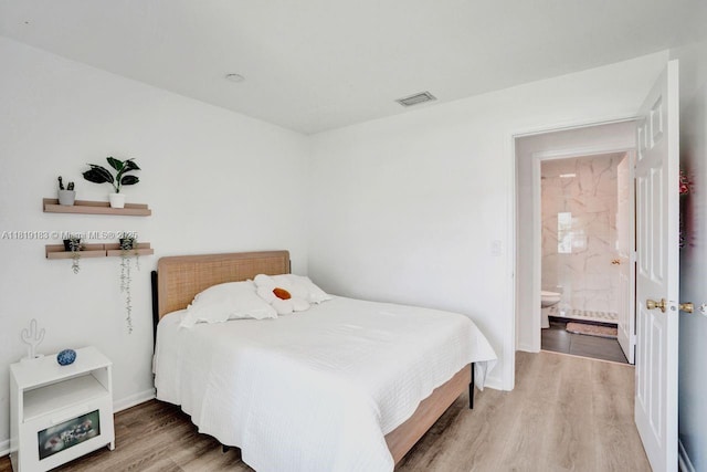 18998 Cloud Lake Cir, Boca Raton, FL 33496 - bedroom featuring wood finished floors and baseboards