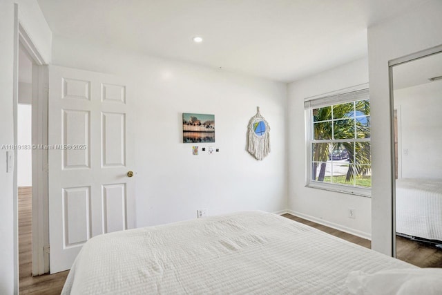 18998 Cloud Lake Cir, Boca Raton, FL 33496 - bedroom with wood finished floors and recessed lighting