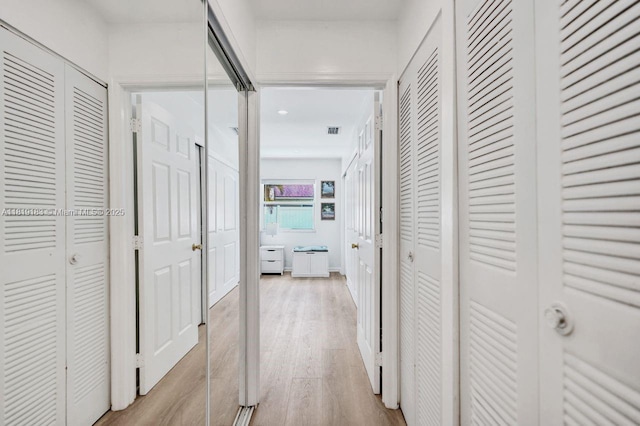 18998 Cloud Lake Cir, Boca Raton, FL 33496 - corridor featuring light wood finished floors