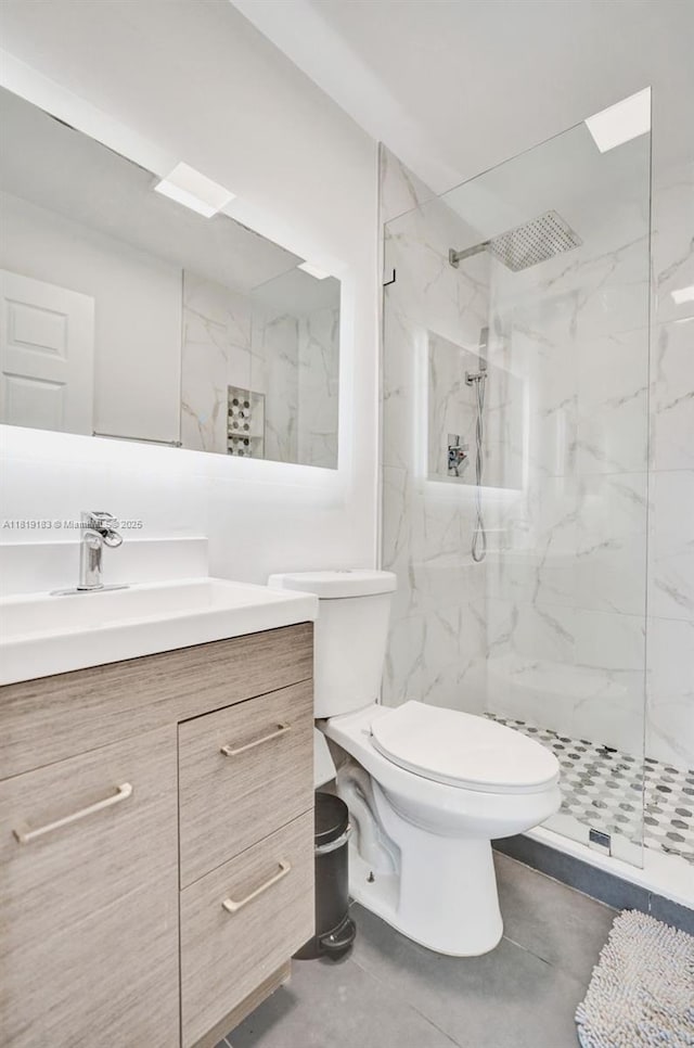 18998 Cloud Lake Cir, Boca Raton, FL 33496 - bathroom featuring a marble finish shower, vanity, and toilet