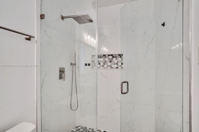 18998 Cloud Lake Cir, Boca Raton, FL 33496 - bathroom featuring a marble finish shower and toilet