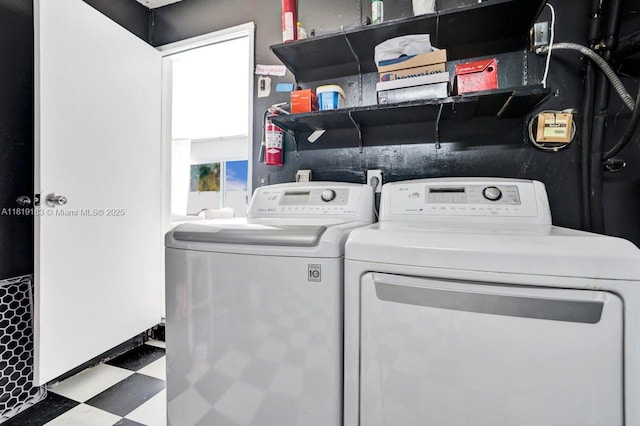 18998 Cloud Lake Cir, Boca Raton, FL 33496 - laundry room featuring tile patterned floors and washer and dryer