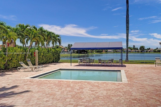 18998 Cloud Lake Cir, Boca Raton, FL 33496 - community pool with a patio and a water view