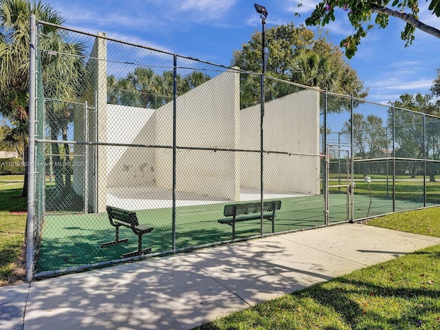 18998 Cloud Lake Cir, Boca Raton, FL 33496 - view of tennis court featuring a gate