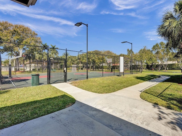 18998 Cloud Lake Cir, Boca Raton, FL 33496 - view of tennis court with community basketball court and a gate