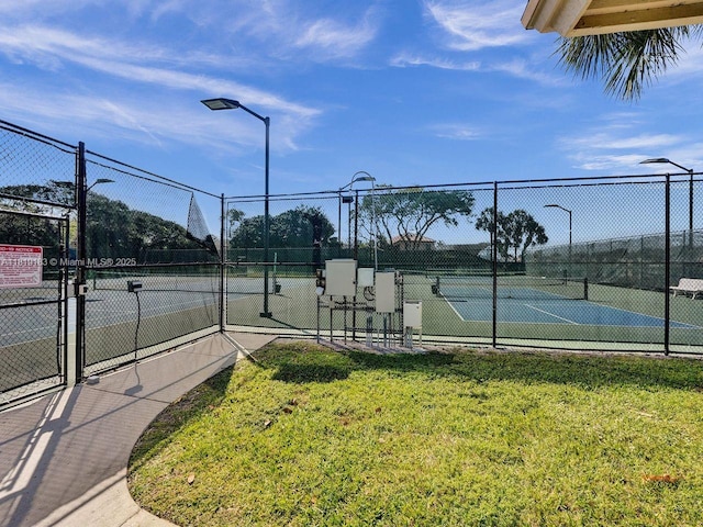 18998 Cloud Lake Cir, Boca Raton, FL 33496 - view of tennis court featuring a gate