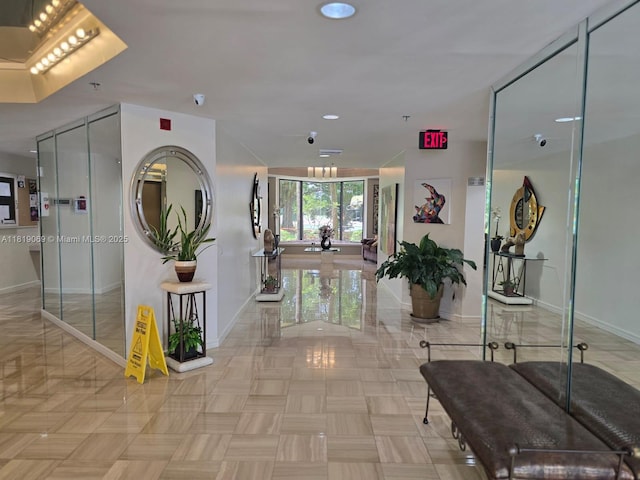 7400 Radice Ct Unit 402, Lauderhill, FL 33319 - hallway featuring baseboards and recessed lighting