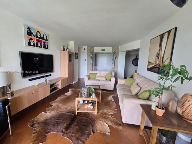 7400 Radice Ct Unit 402, Lauderhill, FL 33319 - living room with wood finished floors