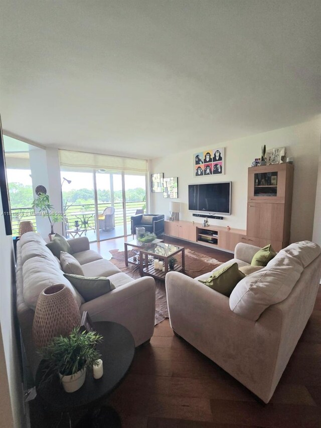 7400 Radice Ct Unit 402, Lauderhill, FL 33319 - living room with wood finished floors