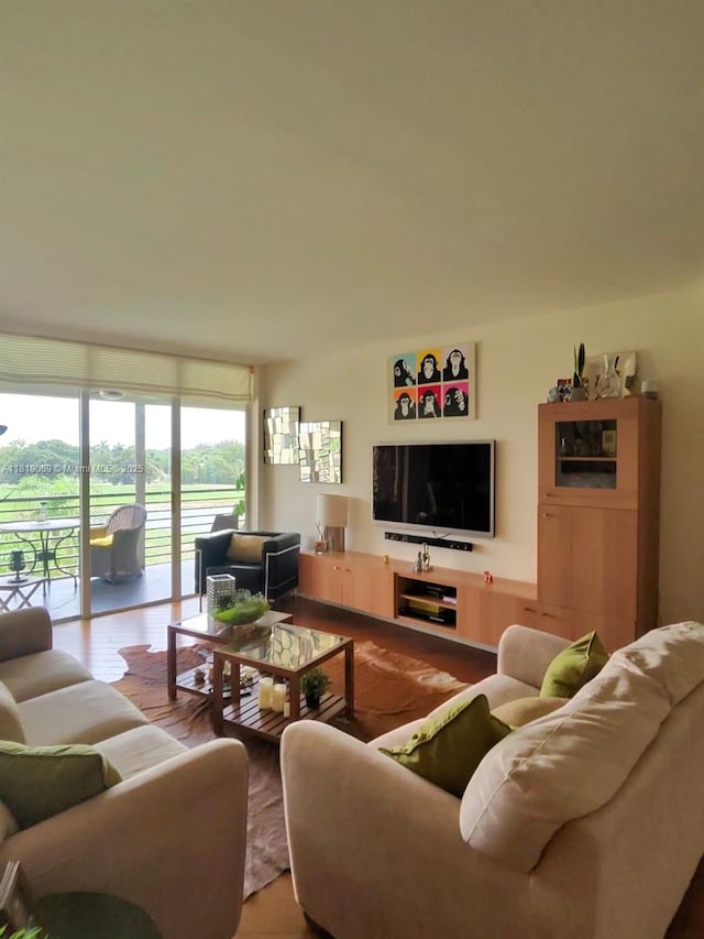 7400 Radice Ct Unit 402, Lauderhill, FL 33319 - living room featuring wood finished floors