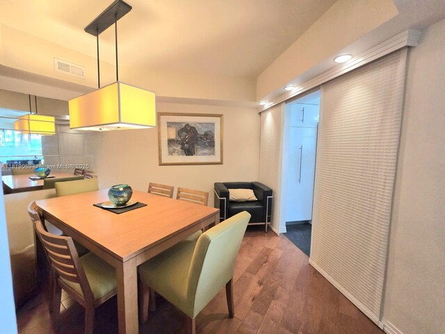 7400 Radice Ct Unit 402, Lauderhill, FL 33319 - dining space featuring wood finished floors