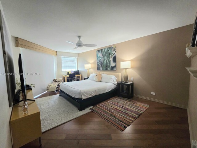 7400 Radice Ct Unit 402, Lauderhill, FL 33319 - bedroom with hardwood / wood-style floors, baseboards, and a ceiling fan