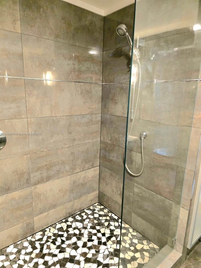 7400 Radice Ct Unit 402, Lauderhill, FL 33319 - bathroom featuring a tile shower