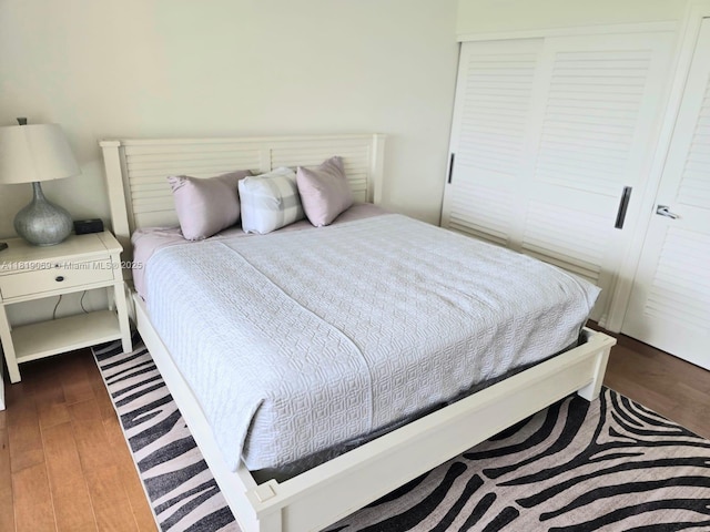 7400 Radice Ct Unit 402, Lauderhill, FL 33319 - bedroom featuring dark wood finished floors