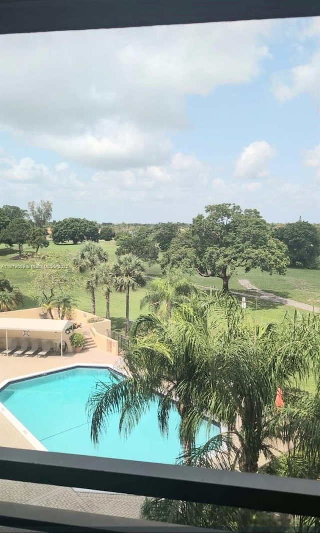 7400 Radice Ct Unit 402, Lauderhill, FL 33319 - community pool with a patio