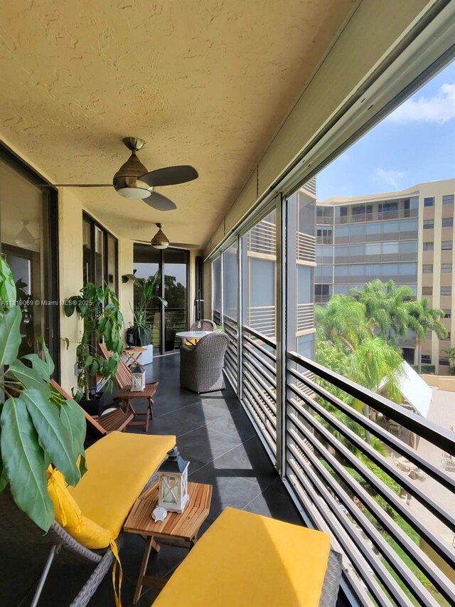 7400 Radice Ct Unit 402, Lauderhill, FL 33319 - sunroom with ceiling fan and plenty of natural light