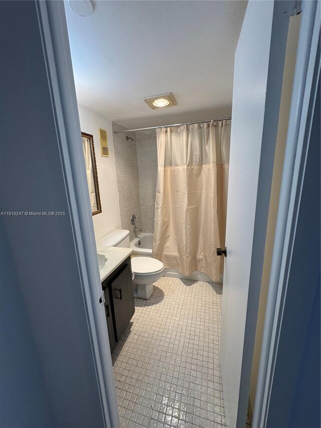 1100 Saint Charles Pl Unit 203, Pembroke Pines, FL 33026 - full bath featuring shower / tub combo, toilet, vanity, and tile patterned floors