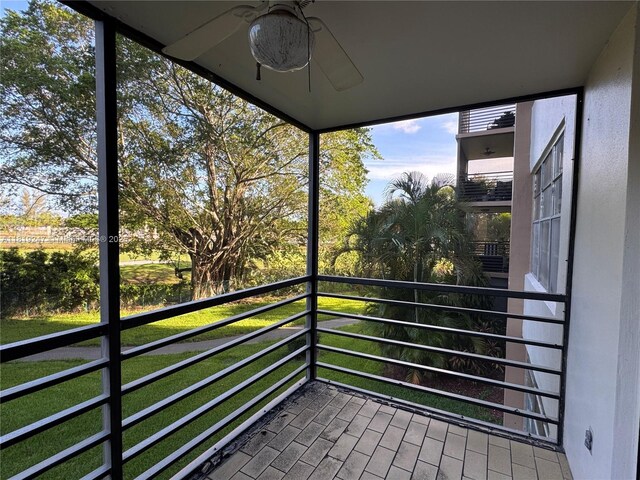 1100 Saint Charles Pl Unit 203, Pembroke Pines, FL 33026 - unfurnished sunroom with a ceiling fan
