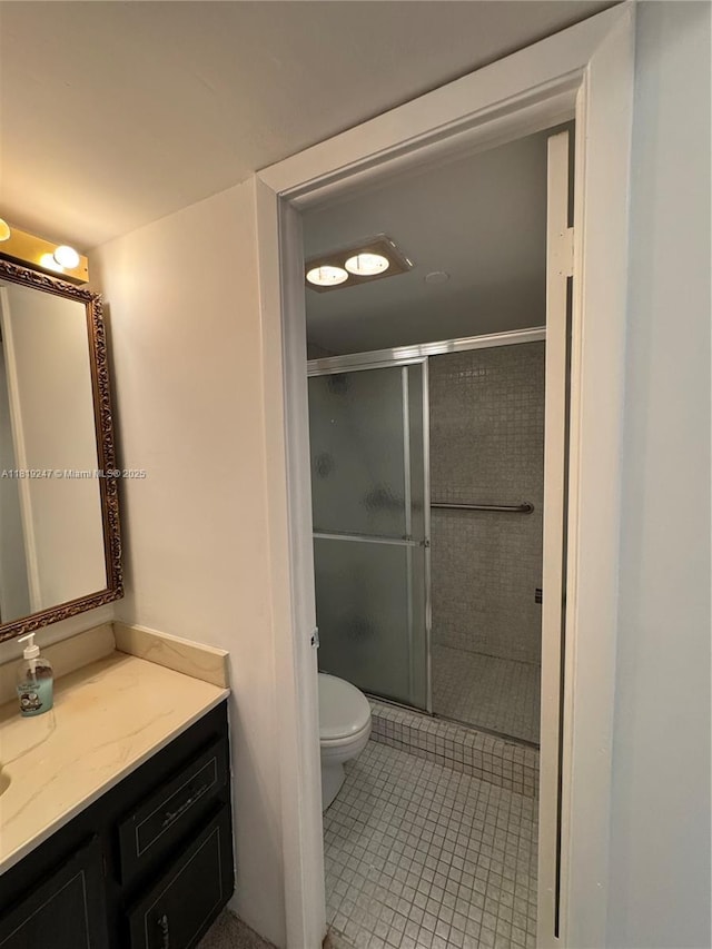 1100 Saint Charles Pl Unit 203, Pembroke Pines, FL 33026 - full bathroom featuring vanity, toilet, a stall shower, and tile patterned floors