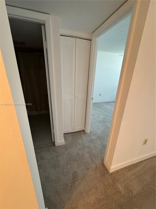 1100 Saint Charles Pl Unit 203, Pembroke Pines, FL 33026 - hall featuring carpet flooring and baseboards