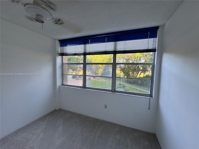 1100 Saint Charles Pl Unit 203, Pembroke Pines, FL 33026 - carpeted spare room featuring a textured ceiling