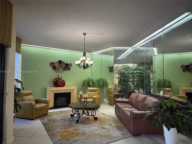 1100 Saint Charles Pl Unit 203, Pembroke Pines, FL 33026 - living room featuring a fireplace, light tile patterned floors, and a textured ceiling