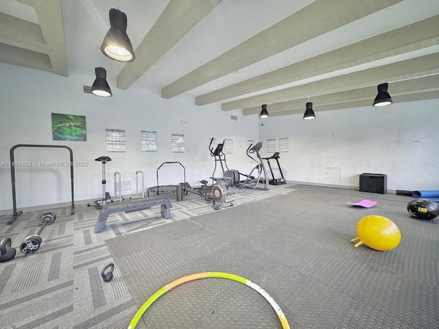 2741 Taft St Unit 410, Hollywood, FL 33020 - exercise room featuring carpet flooring and beam ceiling