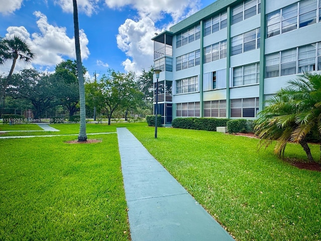 2741 Taft St Unit 410, Hollywood, FL 33020 - view of community featuring a lawn