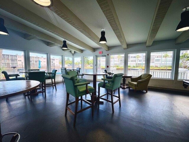2741 Taft St Unit 410, Hollywood, FL 33020 - sunroom with beam ceiling and plenty of natural light