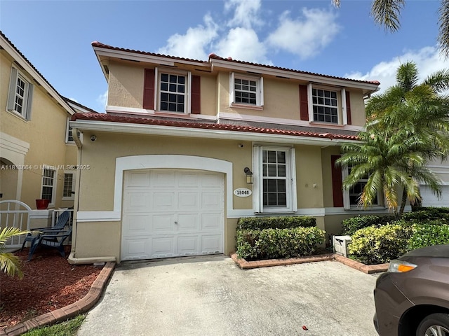 15048 SW 51st St, Davie, FL 33331 - mediterranean / spanish home with an attached garage, stucco siding, and driveway