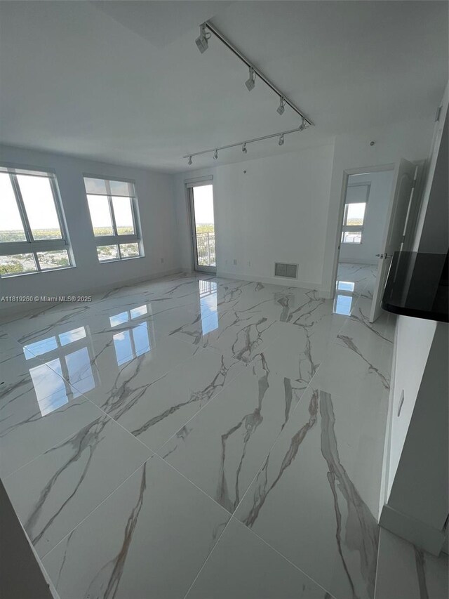 7350 SW 89th St Unit 2011S, Miami, FL 33156 - unfurnished room with light marble finish floors