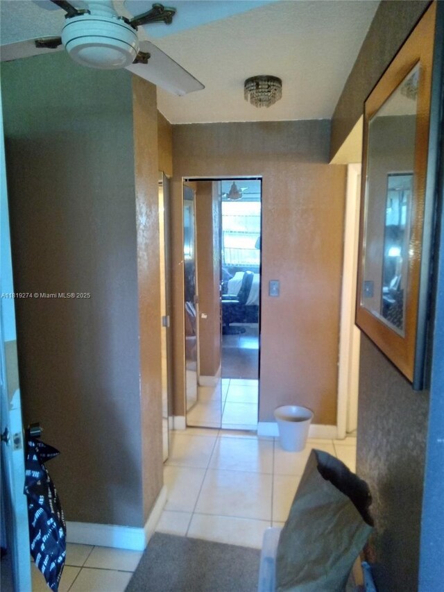 1000 Saint Charles Pl Unit L2, Pembroke Pines, FL 33026 - corridor featuring tile patterned flooring and baseboards